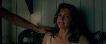 Movie still from “Gerald's Game” (2017), directed by Mike Flanagan – A woman is crying while a man is brushing her hair; Close Up shot, Over the shoulder angle