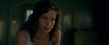 Movie still from “Gerald's Game” (2017), directed by Mike Flanagan – A person with long brown hair; Close Up shot, Over the shoulder angle