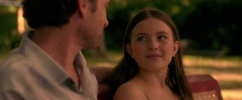 Movie still from “Gerald's Game” (2017), directed by Mike Flanagan – A young girl sitting next to an older man; Close Up shot, Over the shoulder angle