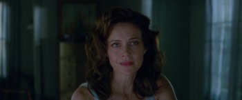 Movie still from “Gerald's Game” (2017), directed by Mike Flanagan – A person with long brown hair; Close Up shot, Over the shoulder angle