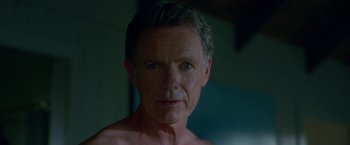 Movie still from “Gerald's Game” (2017), directed by Mike Flanagan – A person wearing a shirt; Close Up shot, Over the shoulder angle