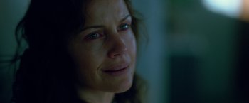 Movie still from “Gerald's Game” (2017), directed by Mike Flanagan – A woman's face in the dark; Close Up shot, Over the shoulder angle