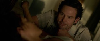 Movie still from “Gerald's Game” (2017), directed by Mike Flanagan – A person looking at the camera; Close Up shot, Over the shoulder angle