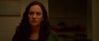 Movie still from “Gerald's Game” (2017), directed by Mike Flanagan – A person wearing a green shirt; Close Up shot, Over the shoulder angle