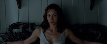 Movie still from “Gerald's Game” (2017), directed by Mike Flanagan – A woman in a white top is looking at the camera; Close Up shot, Low angle