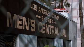 Movie still from “Next Friday” (2000), directed by Steve Carr – A sign that reads los angeles county sheriffs men's central jail; Wide shot, Low angle
