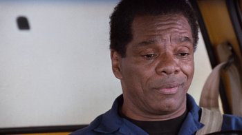Movie still from “Next Friday” (2000), directed by Steve Carr – An older black man with a concerned look on his face; Close Up shot, Low angle