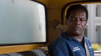 Movie still from “Next Friday” (2000), directed by Steve Carr – A person sitting in a vehicle; Close Up shot, Low angle