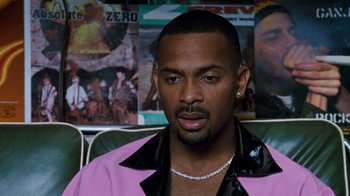 Movie still from “Next Friday” (2000), directed by Steve Carr – A person wearing a pink jacket; Close Up shot, Over the shoulder angle