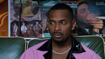 Movie still from “Next Friday” (2000), directed by Steve Carr – A person wearing a pink jacket; Close Up shot, Over the shoulder angle