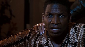 Movie still from “Next Friday” (2000), directed by Steve Carr – A person with a ring on his finger; Close Up shot, Low angle