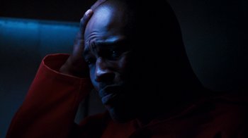 Movie still from “Next Friday” (2000), directed by Steve Carr – A man with his hand on his head; Close Up shot, High angle