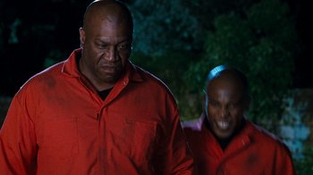 Movie still from “Next Friday” (2000), directed by Steve Carr – A couple of men standing next to each other; Close Up shot, Low angle