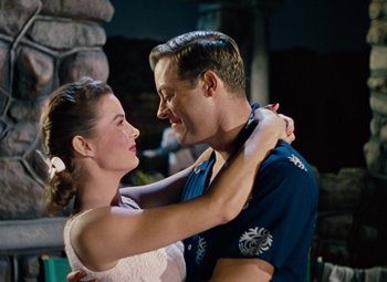 Movie still from “Niagara” (1953), directed by Henry Hathaway – A man and a woman are dancing together; Medium shot, Low angle