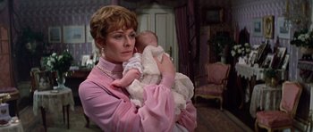 Movie still from “Nicholas and Alexandra” (1971), directed by Franklin J. Schaffner – A woman holding a baby in her arms; Close Up shot, Over the shoulder angle