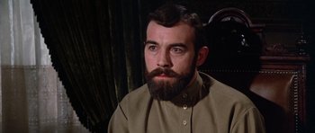 Movie still from “Nicholas and Alexandra” (1971), directed by Franklin J. Schaffner – A man with a goatee and a beard; Close Up shot, Low angle