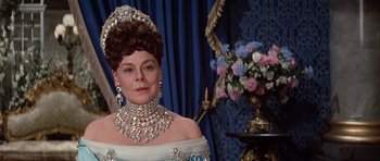 Movie still from “Nicholas and Alexandra” (1971), directed by Franklin J. Schaffner – A woman wearing a tiara and a necklace; Close Up shot, Over the shoulder angle
