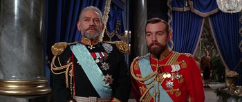 Movie still from “Nicholas and Alexandra” (1971), directed by Franklin J. Schaffner – Two men dressed up in military uniforms and medals; Medium shot, Low angle