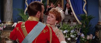 Movie still from “Nicholas and Alexandra” (1971), directed by Franklin J. Schaffner – A man and a woman dressed up in formal wear; Medium shot, Over the shoulder angle