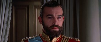 Movie still from “Nicholas and Alexandra” (1971), directed by Franklin J. Schaffner – A person with a beard wearing a uniform; Close Up shot, Low angle