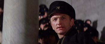 Movie still from “Nicholas and Alexandra” (1971), directed by Franklin J. Schaffner – A person wearing a hat; Close Up shot, Low angle