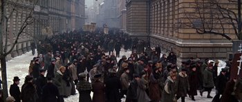 Movie still from “Nicholas and Alexandra” (1971), directed by Franklin J. Schaffner – A crowd of people walking down a street; Extreme Wide shot, High angle