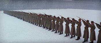 Movie still from “Nicholas and Alexandra” (1971), directed by Franklin J. Schaffner – A long line of soldiers in the snow holding rifles; Wide shot, Low angle