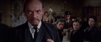 Movie still from “Nicholas and Alexandra” (1971), directed by Franklin J. Schaffner – A group of people standing in a room; Close Up shot, Low angle