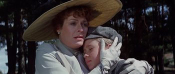 Movie still from “Nicholas and Alexandra” (1971), directed by Franklin J. Schaffner – A woman and a boy are hugging each other; Close Up shot, Low angle
