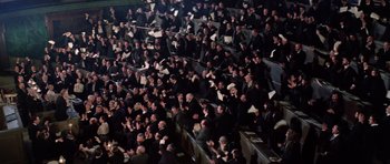 Movie still from “Nicholas and Alexandra” (1971), directed by Franklin J. Schaffner – A large group of people sitting in a stadium; Extreme Wide shot, High angle