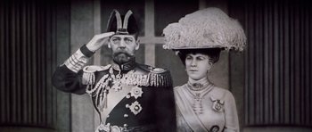 Movie still from “Nicholas and Alexandra” (1971), directed by Franklin J. Schaffner – An old photo of a man and a woman; Close Up shot, Low angle