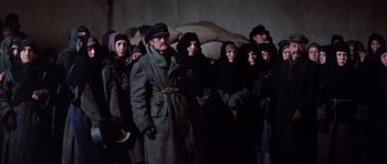Movie still from “Nicholas and Alexandra” (1971), directed by Franklin J. Schaffner – A group of people standing next to each other; Wide shot, Low angle