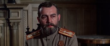 Movie still from “Nicholas and Alexandra” (1971), directed by Franklin J. Schaffner – A person with a beard wearing a uniform; Close Up shot, Low angle