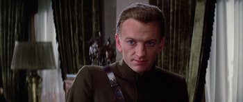 Movie still from “Nicholas and Alexandra” (1971), directed by Franklin J. Schaffner – A person wearing a jacket; Close Up shot, Low angle