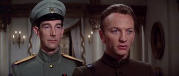 Movie still from “Nicholas and Alexandra” (1971), directed by Franklin J. Schaffner – Two men in military uniforms standing next to each other; Close Up shot, Low angle