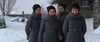 Movie still from “Nicholas and Alexandra” (1971), directed by Franklin J. Schaffner – A group of young women wearing winter coats and hats; Medium shot, High angle