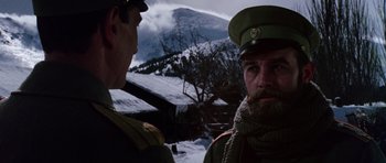 Movie still from “Nicholas and Alexandra” (1971), directed by Franklin J. Schaffner – Two men in military uniforms standing next to each other in the snow; Close Up shot, Low angle