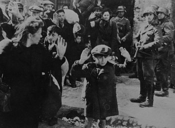Movie still from “Night and Fog” (1956), directed by Alain Resnais – A group of men and women in uniform waving at each other; Wide shot, High angle