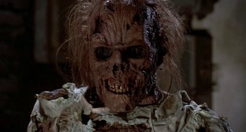 Movie still from “Night of the Creeps” (1986), directed by Fred Dekker – The face of a dead zombie; Close Up shot, Low angle