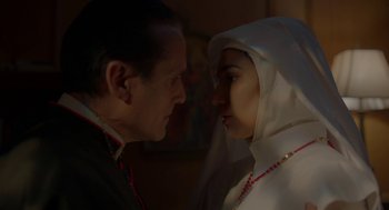 Movie still from “Nightmare Cinema” (2018), directed by Alejandro Brugués – A man and a woman are looking at one another; Close Up shot, Low angle