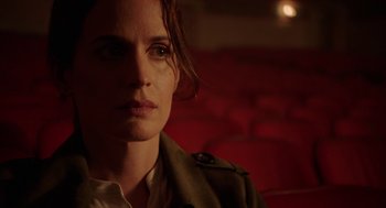 Movie still from “Nightmare Cinema” (2018), directed by Alejandro Brugués – A person wearing a jacket; Close Up shot, Over the shoulder angle