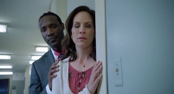 Movie still from “Nightmare Cinema” (2018), directed by Alejandro Brugués – A man and a woman standing next to each other; Close Up shot, Low angle