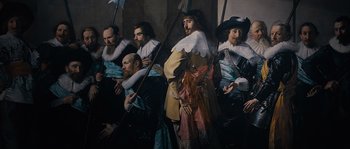 Movie still from “Nightwatching” (2007), directed by Peter Greenaway – A group of men in period clothing are standing together; Medium shot, Low angle