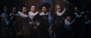 Movie still from “Nightwatching” (2007), directed by Peter Greenaway – A group of men standing next to each other; Medium shot, Over the shoulder angle