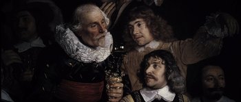 Movie still from “Nightwatching” (2007), directed by Peter Greenaway – A painting of three men in renaissance garb; Close Up shot, Low angle