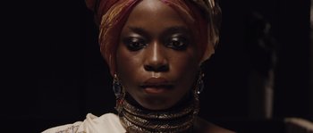 Movie still from “Nightwatching” (2007), directed by Peter Greenaway – A person wearing a head scarf; Close Up shot, Low angle