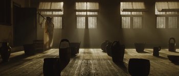 Movie still from “Nightwatching” (2007), directed by Peter Greenaway – The sun is shining through the windows of a room; Extreme Wide shot, Low angle