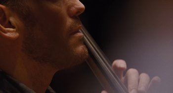 Movie still from “Nimic” (2019), directed by Yorgos Lanthimos – A man's face with his mouth open; Extreme Close Up shot, Low angle