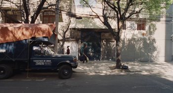 Movie still from “Nimic” (2019), directed by Yorgos Lanthimos – A truck parked on the side of the street; Wide shot, High angle