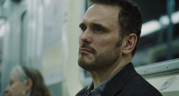 Movie still from “Nimic” (2019), directed by Yorgos Lanthimos – A person wearing a jacket; Close Up shot, Low angle